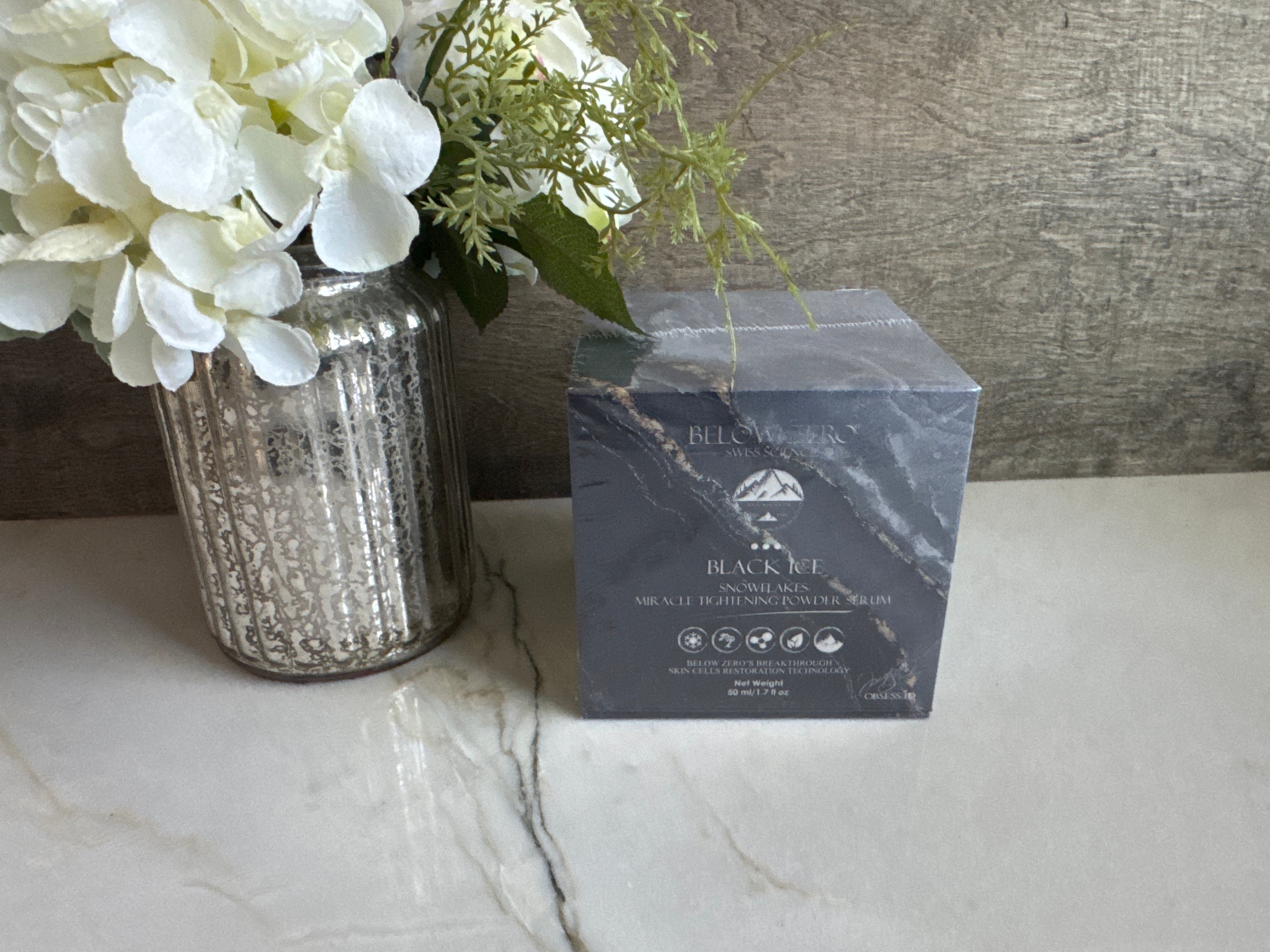 Miracle Tightening Powder Facial serum by Below Zero